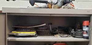 lot 285 image: Contents of Shelf.  Large Quantity of Circular Saw Blades w Drill Bit Set & Angle Grinder