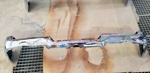 lot 342 image: NEW Dodge Ram Dual Exhaust Rear Chrome Bumper.  Fits 2018-2023