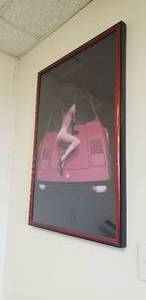 lot 382 image: 1980s Sophicasted Lady Ferrari Poster in Frame