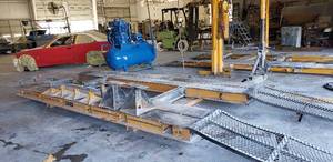 lot 99 image: Euro Rack Frame Pulling Machine w Ramp, Euro Tower, Posts & Clamps