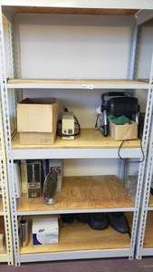 lot 387 image: Metal Shelf w Contents.  Floor fan, Door Speakers, Repair Parts Manuals & Chrome Exhaust Trims