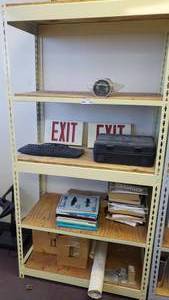 lot 388 image: Metal Shelf w Contents.  Cvorvette Tachometer, Exit Signs, MAC Manifold Gauge Set, Repair Parts Manuals & More
