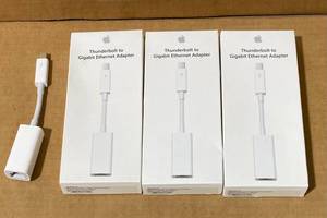 lot 72 image: Lot of 4 - (3) New in Package - Apple Thunderbolt to Gigibit Ethernet Adapter - In Condition As Shown