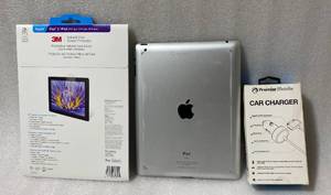 lot 100 image: Lot of 3 - Apple iPad 2nd Generation 16GB BlackSilver, New Sealed M3 Natural View Screen Protector & Premier Mobile Apple 30 Pin Car Charger - In Condition As Shown