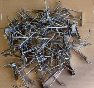 lot 201 image: Lot of Approx. 100 - 5 Grid Wall Hooks - In Condition As Shown