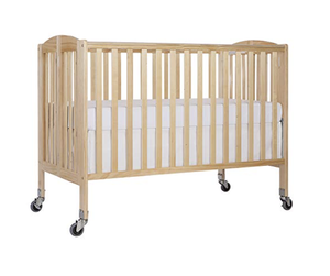 lot 208 image: Dream On Me Folding Full Size Convenience Crib In Natural, Two Adjustable Mattress Height Positions, Comes With Heavy Duty Locking Wheels, Flat Folding - In Condition As Shown