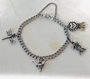 lot 11 image: Sterling Silver James Avery Charm Bracelet W Four Charms