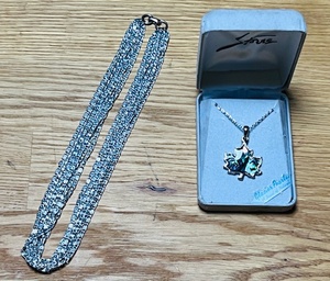 lot 76 image: Signed Sarah Coventry Demi Perure 8 Strand Silver Tone Necklace &amp Storrs Maple Leaf Glacier Pearle Pendant Necklace&nbsp