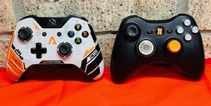 lot 48 image: Microsoft Xbox One Titanfall Limited Edition Controller &amp Microsoft Xbox 360 Wireless Controller&nbsp - Modified to Have Shotgun &amp Pistol Ammo Joystick and Button