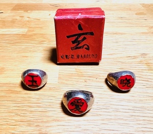 lot 84 image: Three Cosplay Naruto Signet Rings