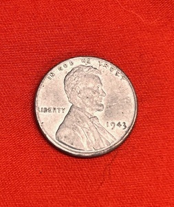 lot 70 image: 1943 Steel Lincoln Wheat Penny No Mint MarkTilted Collar or BroadstruckL on Rim