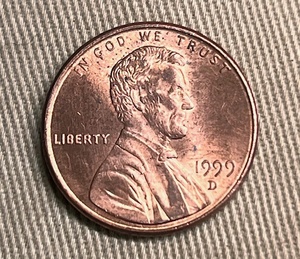 lot 134 image: 1999 Lincoln Penny Error - Light Strike on Reverse Side (See 3rd Picture for Details)
