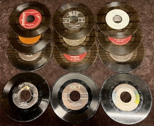 lot 273 image: Twelve (12) 1950s-60s 45 rpm Records in Sleeve - Including Harry Belafonte (Banana Boat), Manfried Mann (Do Wah Diddy Diddy) $ Gene Pitney