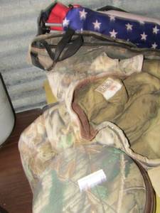 lot 28 image: Camo swivel seat top only, walls insulated coveralls , size XL- American flag foldable chair