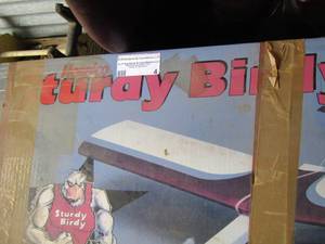 lot 4 image: Sturdy birdy model air plane in original box, box has been opened and taped back
