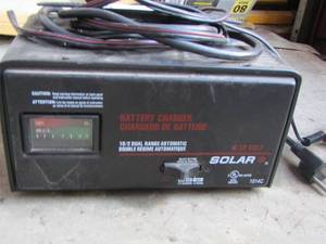 lot 25 image: Solar battery charger electric has no charger cables