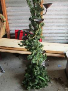 lot 23 image: Approx. 4 ft. tan metal Christmas tree candle stand holds 10 candles