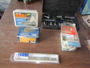 lot 61 image: Craftsman socket set with wrench & drill bits- drywall anchors- kwiktap concrete and more