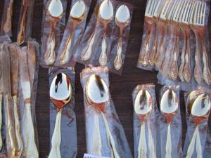 lot 65 image: Stainless steel Korean gold color silverware- with H engraved- also includes sugar cube grabber