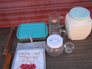 lot 67 image: Kitchen lot includes- A&W mugs, white TREATS Cookie jar- wooden handled knife and more