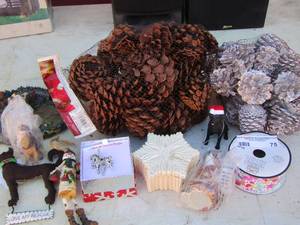 lot 75 image: Christmas lot includes- holiday pinecones- ornaments- ribbon- snowflakes and more
