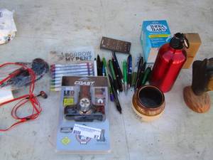 lot 87 image: Pens, coast led, head lamp, headphones and more