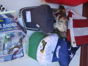 lot 93 image: American flags and ball caps