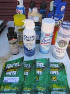 lot 95 image: Mosquito wipes, Lysol, cans of air, scorpion killer plus