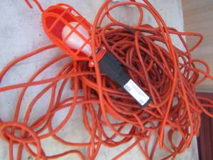 lot 98 image: Long extension cord with shop light attached