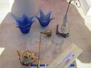 lot 107 image: Blue floral candle holders, mini tea pot, candle snuffer and more