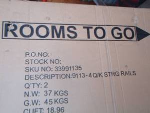 lot 1 image: Gina ROOMS TO GO   QueenKing size bed frame new in box