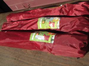 lot 163 image: Ozark trail folding chairs in bag, maroon in color