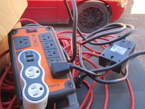 lot 179 image: box of extension cords
