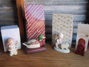 lot 182 image: hallmark Christmas broadcast dcor - precious moments porcelain dolls qty 2, duck music box stand dcor