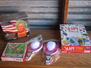 lot 183 image: Hilary Clinton chia pet nib, 2 nib sling shot sets snowball themed, I spy game used