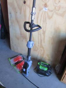 lot 190 image: ego weed eater with string and battery with charger