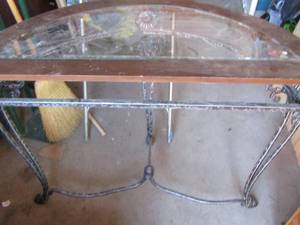 lot 193 image: half moon table needs minor repairs has glass top