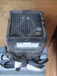 lot 210 image: small rival portable heater