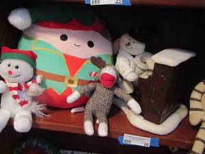 lot 26 image: frosty playing piano, humpty dumpty as Santa, various others