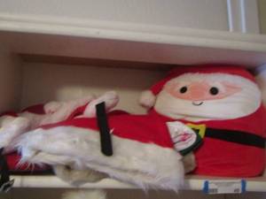 lot 49 image: Santa plush, Santa slippers, and more