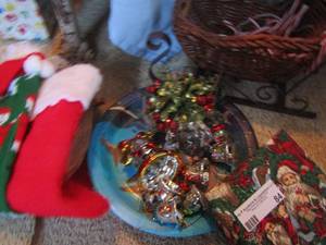 lot 84 image: Christmas stockings- tin cans- wicker sleigh