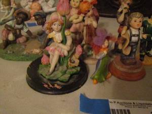 lot 140 image: LOT OF small boy girl figurines