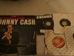 lot 143 image: Johnny Cash record   & 4  45S