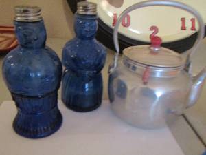 lot 173 image: Blue glass man & Women salt and pepper shakers, metal tea kettle (ONLY)