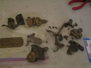 lot 189 image: Vintage door hinges and door nobs, Vintage coca cola bottle opener