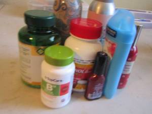 lot 197 image: Lot of travel size deodorant,  sprays , dry shampoo plus