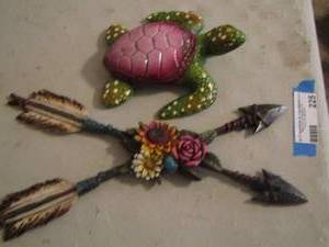 lot 225 image: ceramic turtle, resin arrows with floral dcor