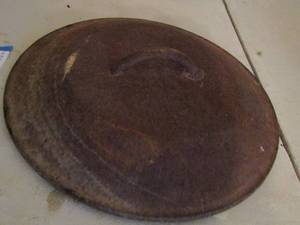 lot 227 image: rusted cast iron lid