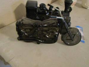 lot 229 image: Avon motorcycle- and train cologne bottles