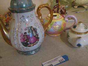 lot 237 image: White and green musical tea pot,   Oneida colorful tea pot plus